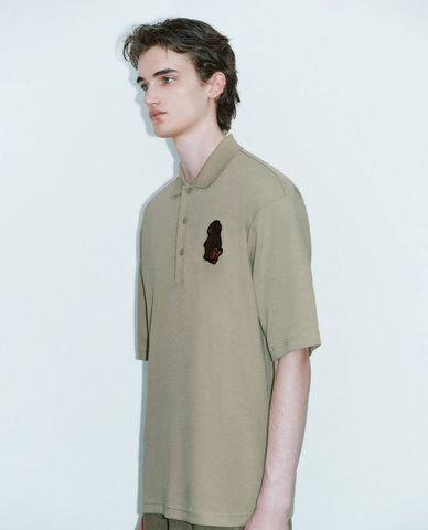  URBAN REVIVO - Áo polo nam cổ bẻ tay ngắn in hình hoạt hình 