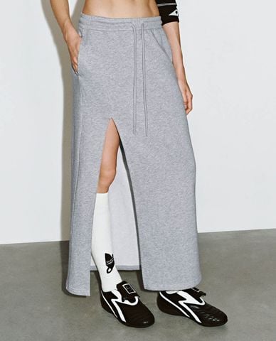  URBAN REVIVO - Chân váy phom suông midi xẻ tà Straight 