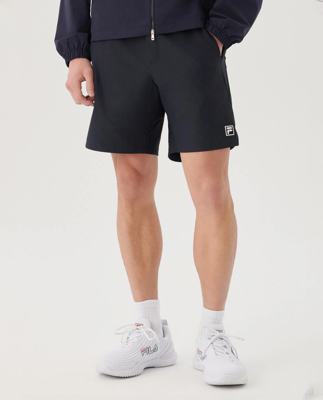 FILA - Quần short nam ống rộng lưng thun Tennis Strechs