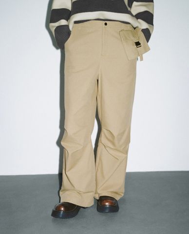  URBAN REVIVO - Quần nữ ống rộng phối túi hiện đại 