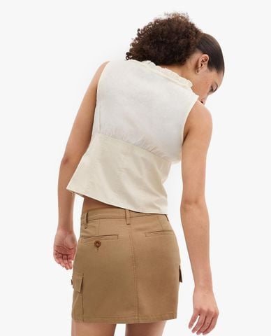  COACH - Chân váy chữ A mini phối túi năng động 