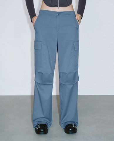  URBAN REVIVO - Quần nữ ống rộng phối túi hiện đại 