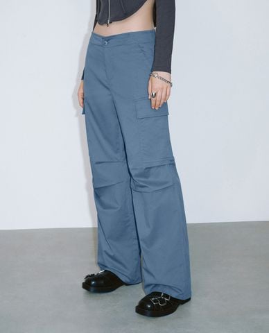  URBAN REVIVO - Quần nữ ống rộng phối túi hiện đại 