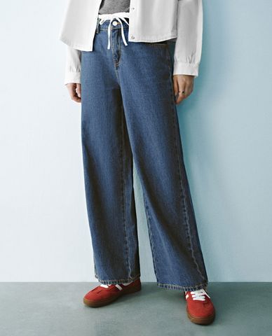  URBAN REVIVO - Quần jeans nữ ống rộng phối dây rút 2 In 1 