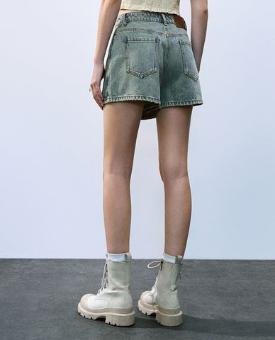  URBAN REVIVO - Chân váy denim mini phom chữ A Front Pocket 