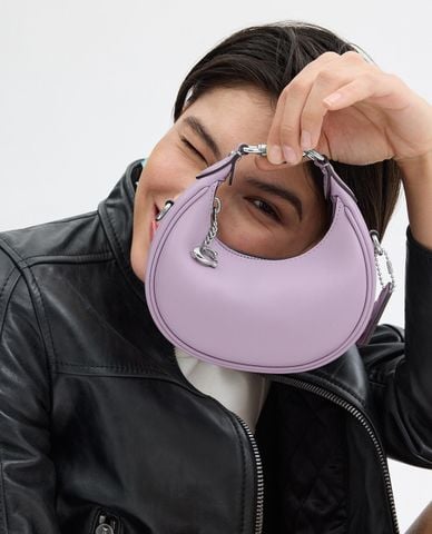  COACH - Túi xách nữ phom bán nguyệt phối mắc xích Jonie 