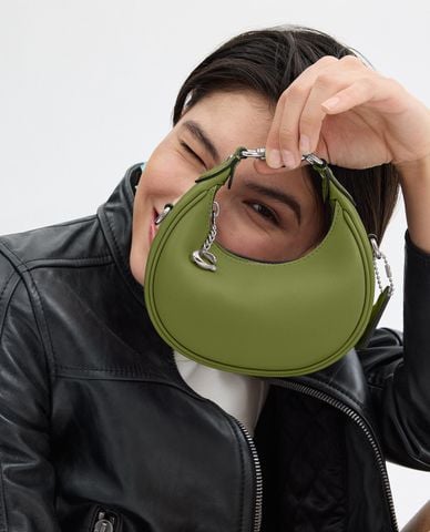  COACH - Túi xách nữ phom bán nguyệt phối mắc xích Jonie 