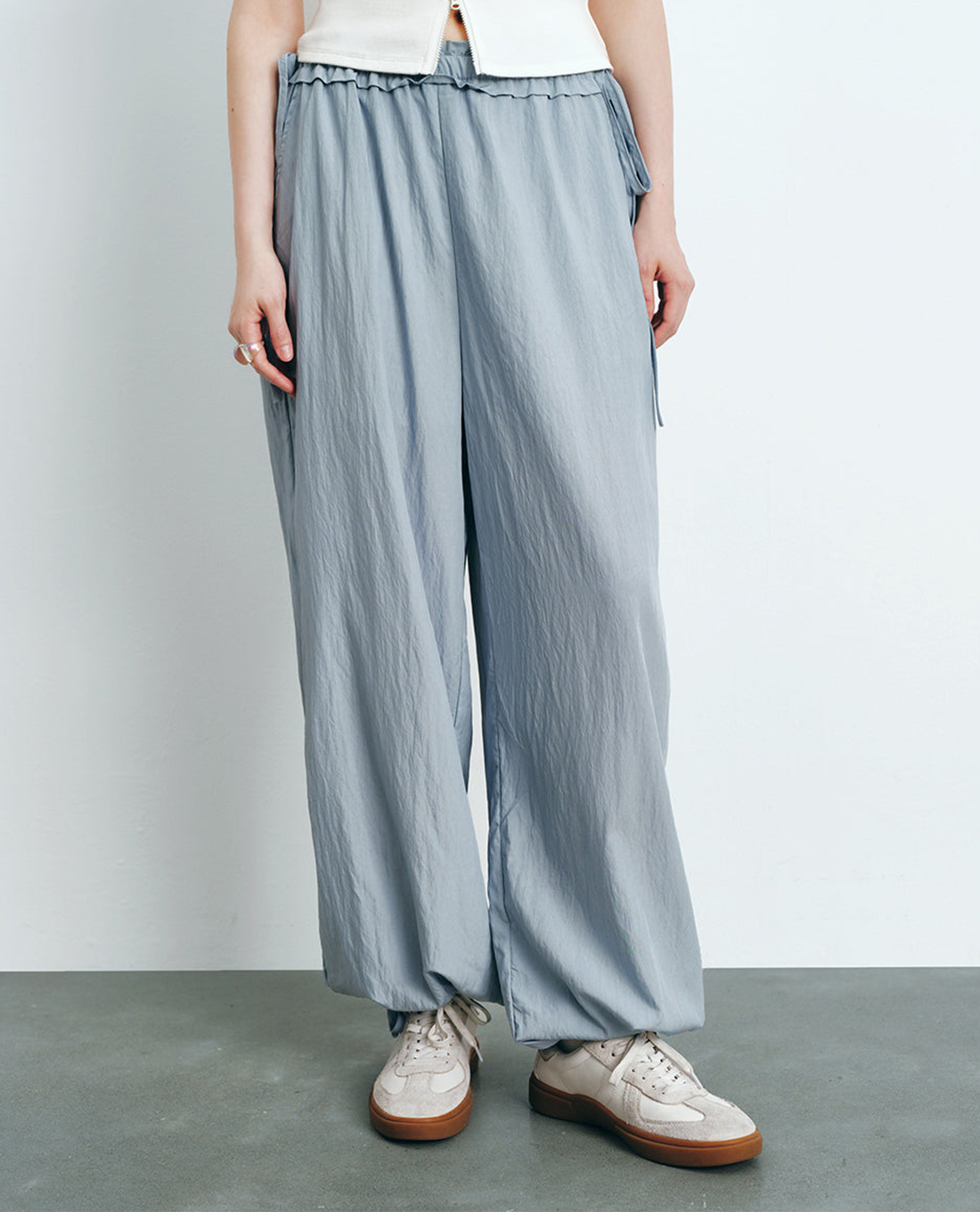 URBAN REVIVO - Quần nữ ống rộng lưng thun thắt nơ Elastic