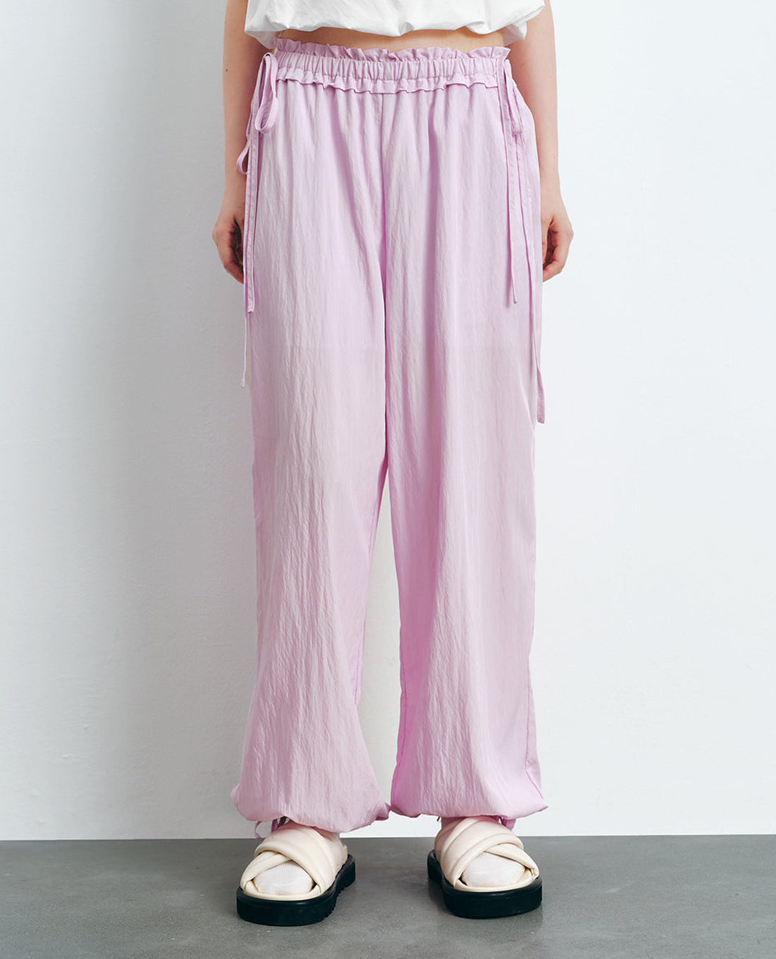 URBAN REVIVO - Quần nữ ống rộng lưng thun thắt nơ Elastic