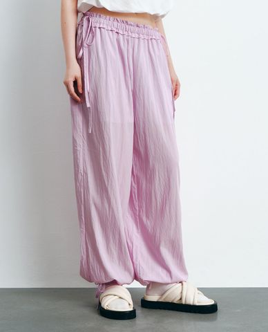  URBAN REVIVO - Quần nữ ống rộng lưng thun thắt nơ Elastic 