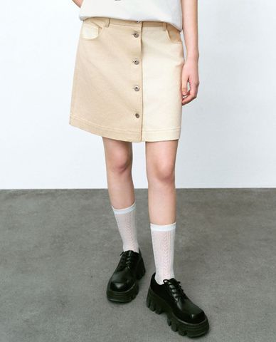  URBAN REVIVO - Chân váy chữ A mini hai màu cá tính 