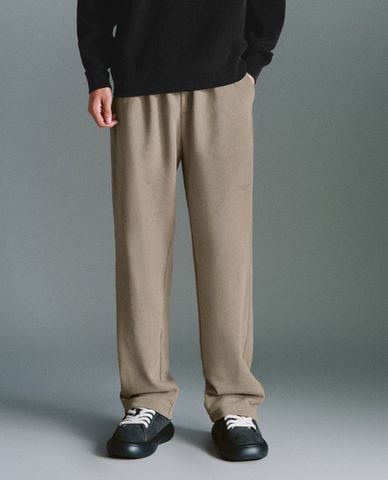  URBAN REVIVO - Quần nam ống rộng lưng thun rút dây Straight 