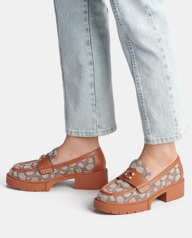  COACH - Giày lười nữ đế cao mũi tròn Leah 