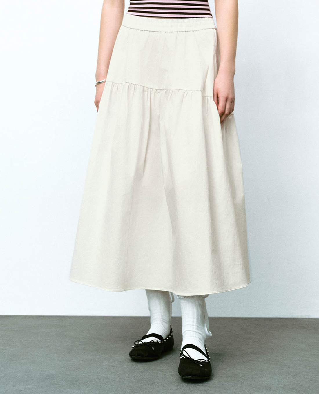 URBAN REVIVO - Chân váy xếp li midi lưng thun A-Line