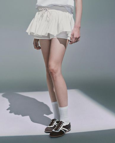  URBAN REVIVO - Quần short giả váy nữ phối dây rút 