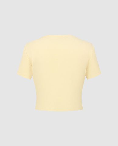  URBAN REVIVO - Áo croptop nữ cổ tròn tay ngắn in hoa 