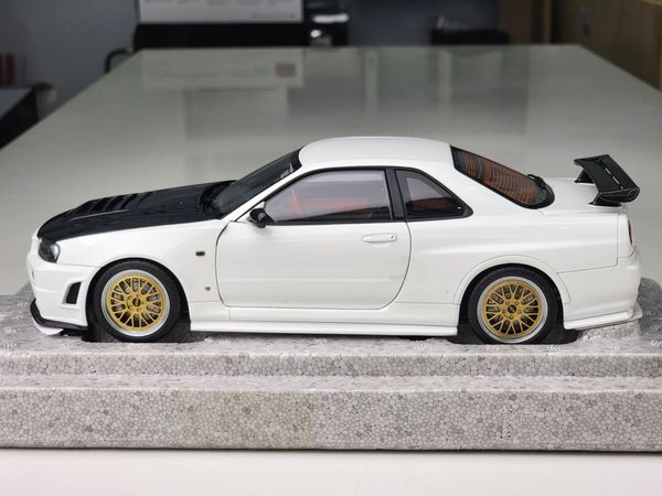 Xe mô hình Nissan Nismo R34 GT-R Z-Tune 1:18 Mortor Helix ( Trắng )