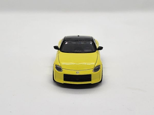 Xe Mô Hình Nissan Z Proto Spec 2023 Ikazuchi Yellow LHD 1:64 Minigt ( Vàng )