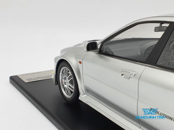 XE MÔ HÌNH Mitsubishi Lance Evolution V 1:18 TarmacWorks (BẠC)