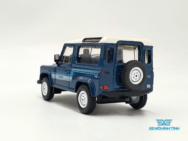 Xe Mô Hình Land Rover Defender 90 County Wagon Stratos Blue LHD 1:64 MiniGT( Xanh )