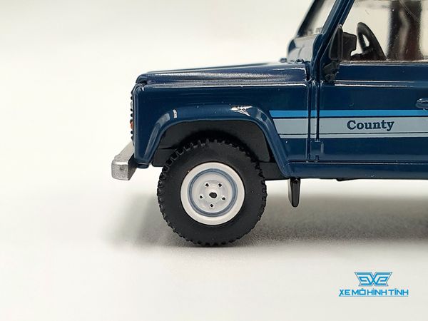 Xe Mô Hình Land Rover Defender 90 County Wagon Stratos Blue LHD 1:64 MiniGT( Xanh )