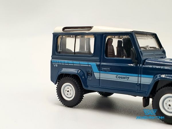 Xe Mô Hình Land Rover Defender 90 County Wagon Stratos Blue LHD 1:64 MiniGT( Xanh )