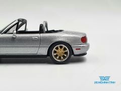 Xe Mô Hình Mazda Miata MX-5 (NA) Tuned Version Silver Stone Metallic LHD 1:64 MiniGT (Xám)