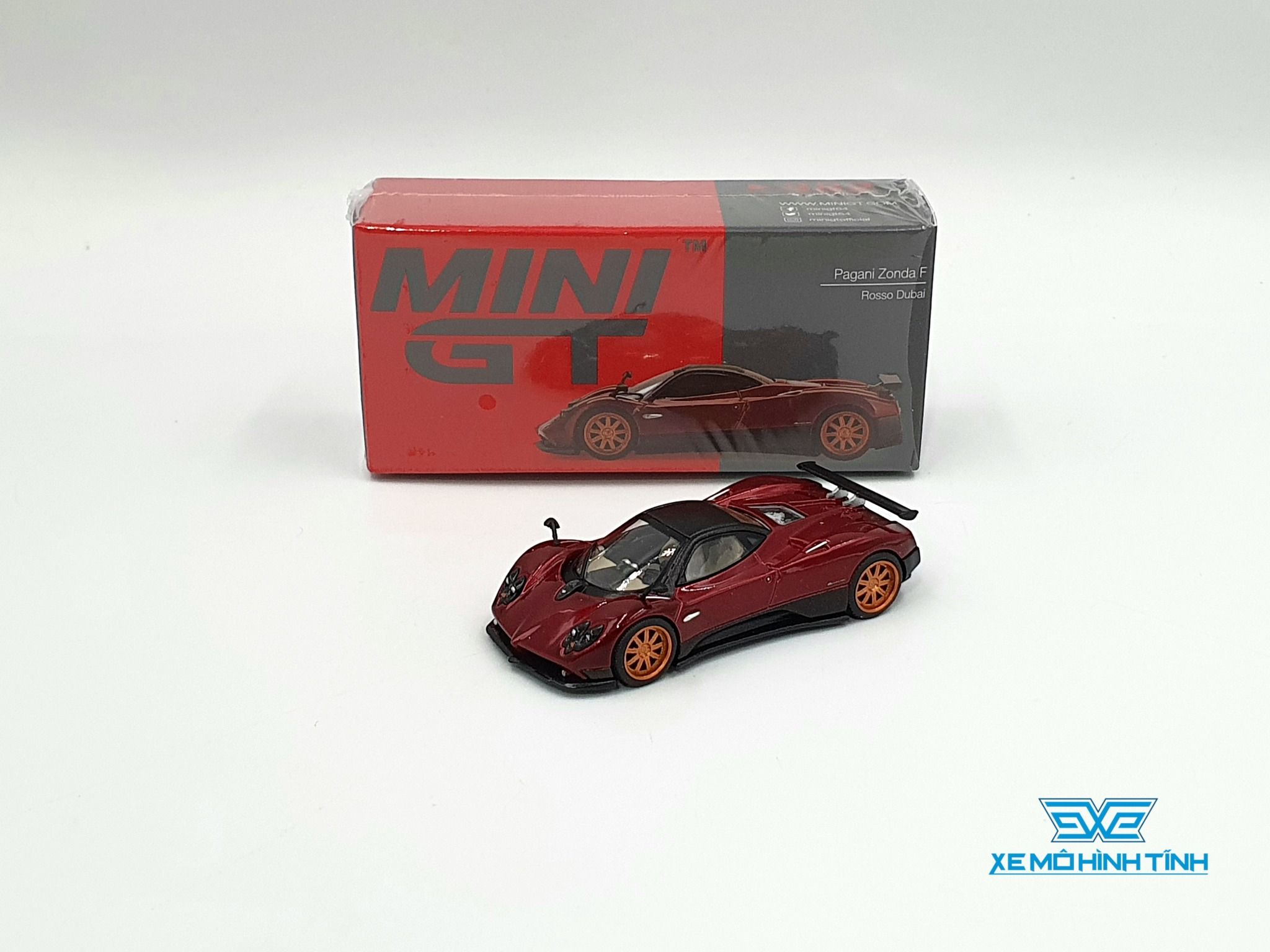 Xe Mô Hình Pagani Zonda F Rosso Dubai LHD 1:64 MiniGT ( Đỏ