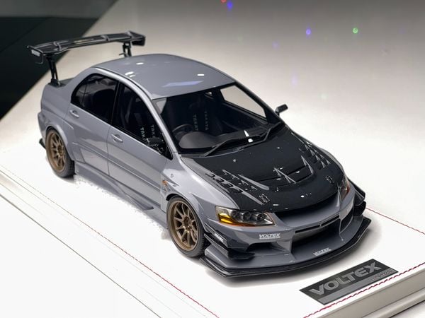 Xe Mô Hình Mitsubishi Voltex 1:18 One Model (Xám)