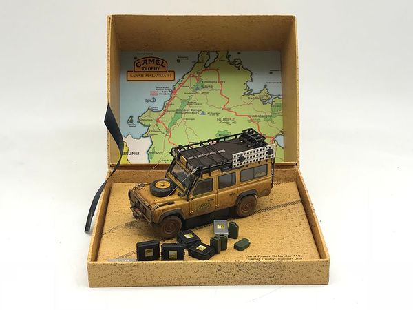 Xe Mô Hình Land Rover Defender 110 ''Camel Trophy'' 1993 1:43 Almost Real ( Vàng Bụi - 4 cửa )