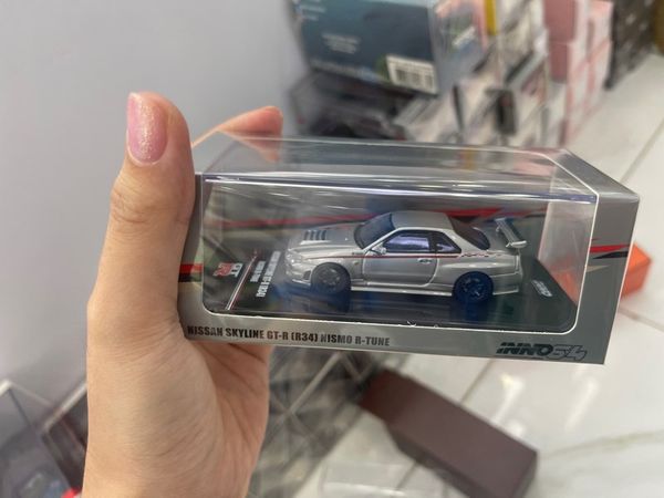 Xe Mô Hình Nissan Skyline GT-R (R34) Nismo R-Tune Silver 1:64 INNO ( Bạc )