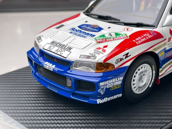 Xe Mô Hình Mitsubishi Lancer Evolution III WRC #4 1:18 One Model ( Trắng Xanh )