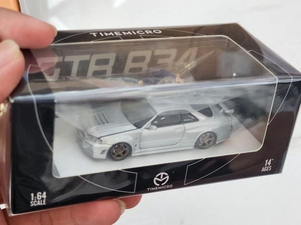 Xe mô hình Nissan GTR R34 Z-Tune Diecast-Openable Hood 1:64 Time Micro (Silver) + Fig