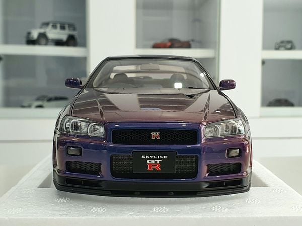 Xe Mô Hình Nissan Skyline GT-R ( R34 ) V-SPEC II 1:18 AUTOart ( Tím Biến Màu )