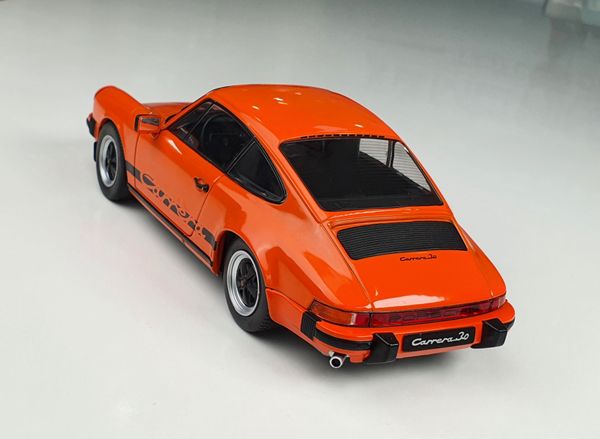 Xe mô hình Porsche 911 3.0 Carrera Orange 1977 1:18 Solido (Cam)