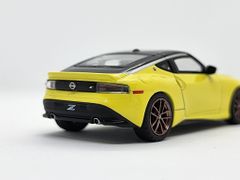 Xe Mô Hình Nissan Z Proto Spec 2023 Ikazuchi Yellow LHD 1:64 Minigt ( Vàng )