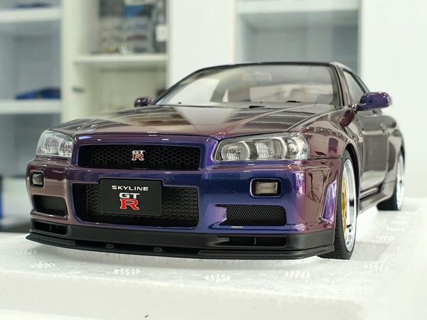 Xe Mô Hình Nissan Skyline GT-R ( R34 ) V-SPEC II 1:18 AUTOart ( Tím Biến Màu )