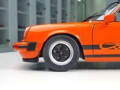 Xe mô hình Porsche 911 3.0 Carrera Orange 1977 1:18 Solido (Cam)