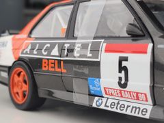 Xe mô hình BMW E30 M3 Group a - Rallye Ypres 1990 1:18 Solido (Đen sọc cam)