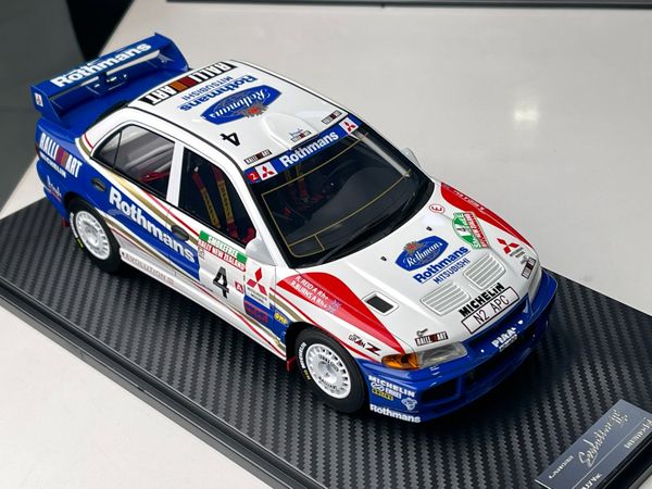 Xe Mô Hình Mitsubishi Lancer Evolution III WRC #4 1:18 One Model ( Trắng Xanh )