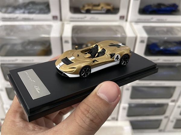 Xe Mô Hình McLaren Elva 1:64 LCD ( Vàng Trắng )