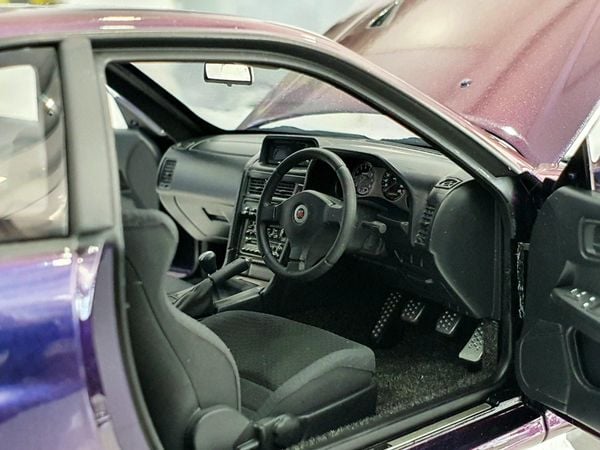Xe Mô Hình Nissan Skyline GT-R ( R34 ) V-SPEC II 1:18 AUTOart ( Tím )