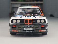 Xe mô hình BMW E30 M3 Group a - Rallye Ypres 1990 1:18 Solido (Đen sọc cam)