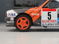 Xe mô hình BMW E30 M3 Group a - Rallye Ypres 1990 1:18 Solido (Đen sọc cam)