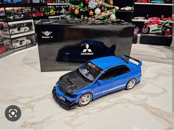 Xe Mô Hình Mitsubishi Lancer Evolution IX 1:18 Super A (Xanh)