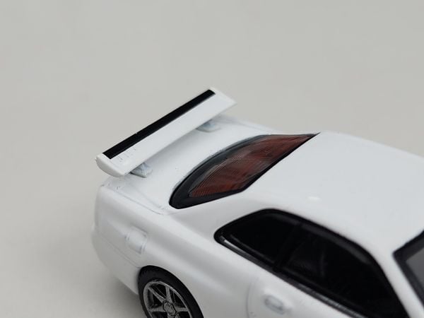 Xe Mô Hình Nissan Skyline GT-R (R34) V- Spec II N1 1:64 MINIGT ( White )