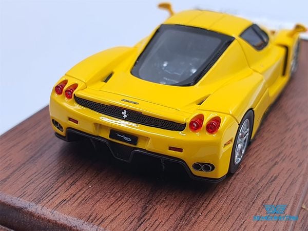 Xe Mô Hình Ferrari Enzo 1:64 DMH ( Vàng )