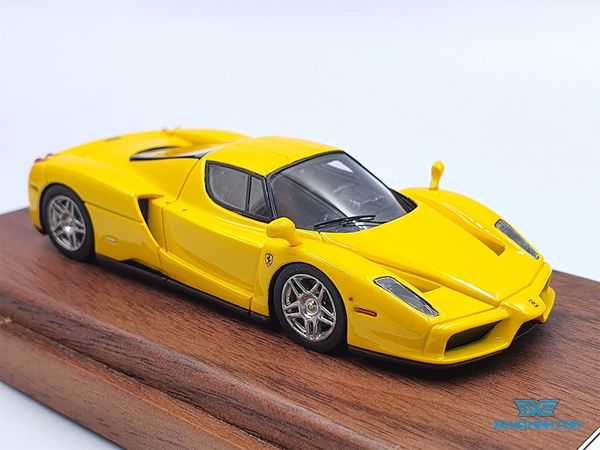 Xe Mô Hình Ferrari Enzo 1:64 DMH ( Vàng )