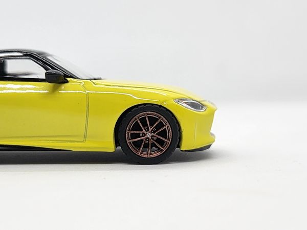 Xe Mô Hình Nissan Z Proto Spec 2023 Ikazuchi Yellow LHD 1:64 Minigt ( Vàng )