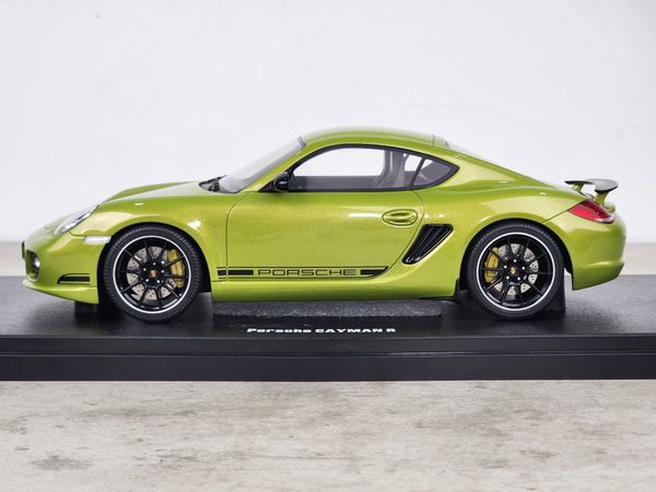 Xe Mô Hình Porsche Cayman R 2012 1:18 GT Spirit ( Peridot Metallic )